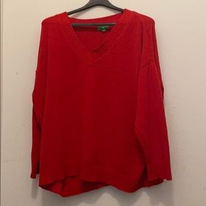 Bright red knit sweater by the brand dip